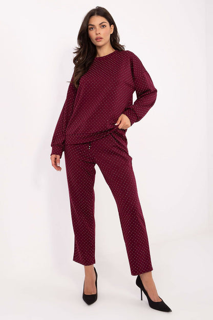 Chic women's tracksuit set by Rue Paris ideal for work and casual outings, featuring a tie waist and slip pockets for practicality.