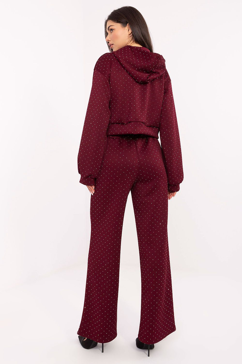 Close-up of Rue Paris women's zip-up hoodie in elegant tracksuit set, showcasing high-quality material and stylish design.