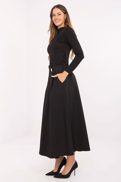 Chic Rue Paris midi skirt showcasing comfort with an elastic back, perfect for all-day wear.