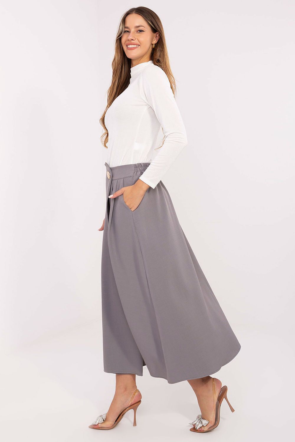 Elegant midi skirt by Rue Paris featuring a pleated front design for a luxurious silhouette.