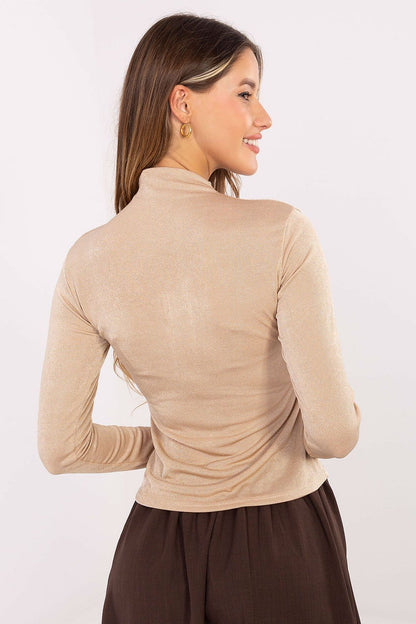 Stunning fitted turtleneck blouse by Rue Paris, made from soft materials offering elegance and comfort, a perfect addition to any sophisticated outfit.
