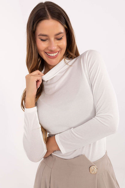 Versatile styling options for Rue Paris turtleneck blouse, perfect for casual and formal occasions.