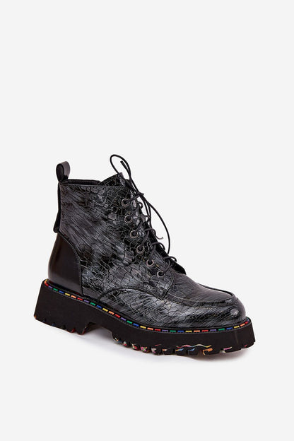 Step in Style Artiker women's leather boots, highlighting the durable craftsmanship and flat heel for all-day comfort, ideal for any fashionable wardrobe.