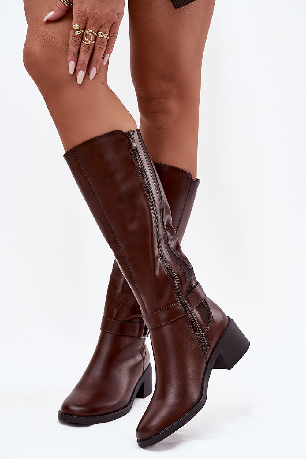 Sophisticated women's thigh-high boots in eco leather by Step in Style, designed with a decorative strap and rounded toes for timeless elegance.