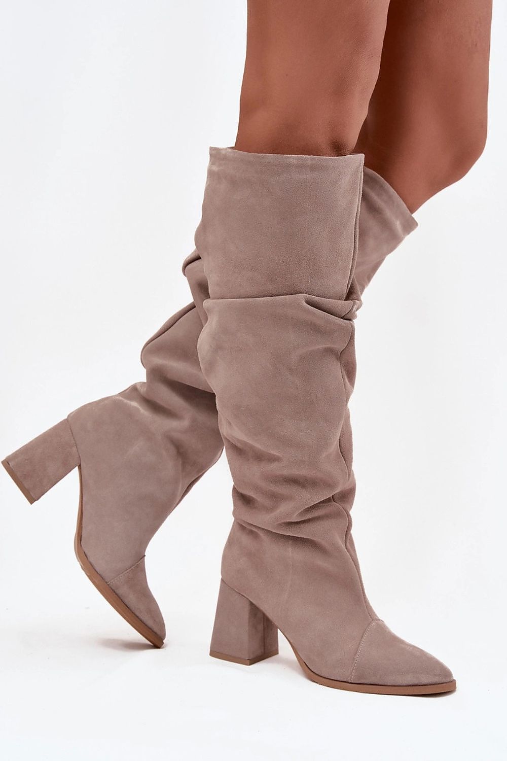 Luxurious women's suede heel boots from Step in style, showcasing a chic pleated design and a stable column heel, perfect for both elegant and casual outfits.