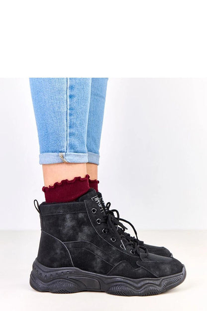 Sophisticated Solea ankle boots crafted from eco-friendly suede leather, showcasing a round toe and practical lace-up closure for a perfect fit.