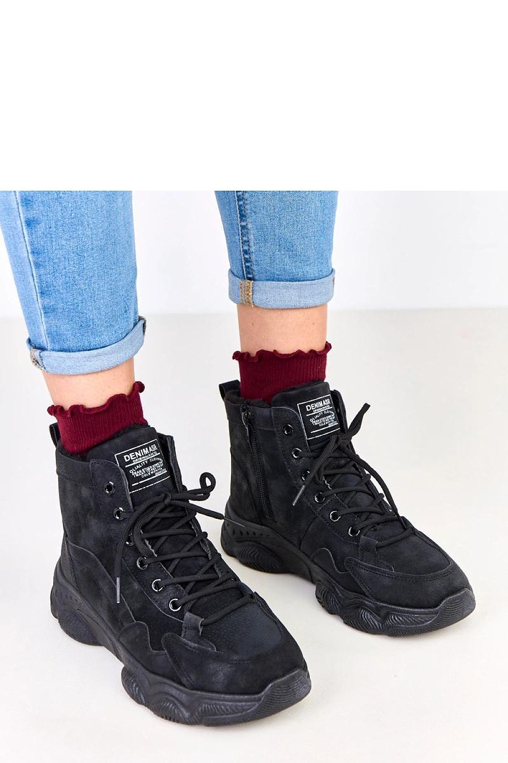 Solea elegant ankle boots with a high shaft, combining fashion and functionality for an exquisite winter footwear choice.