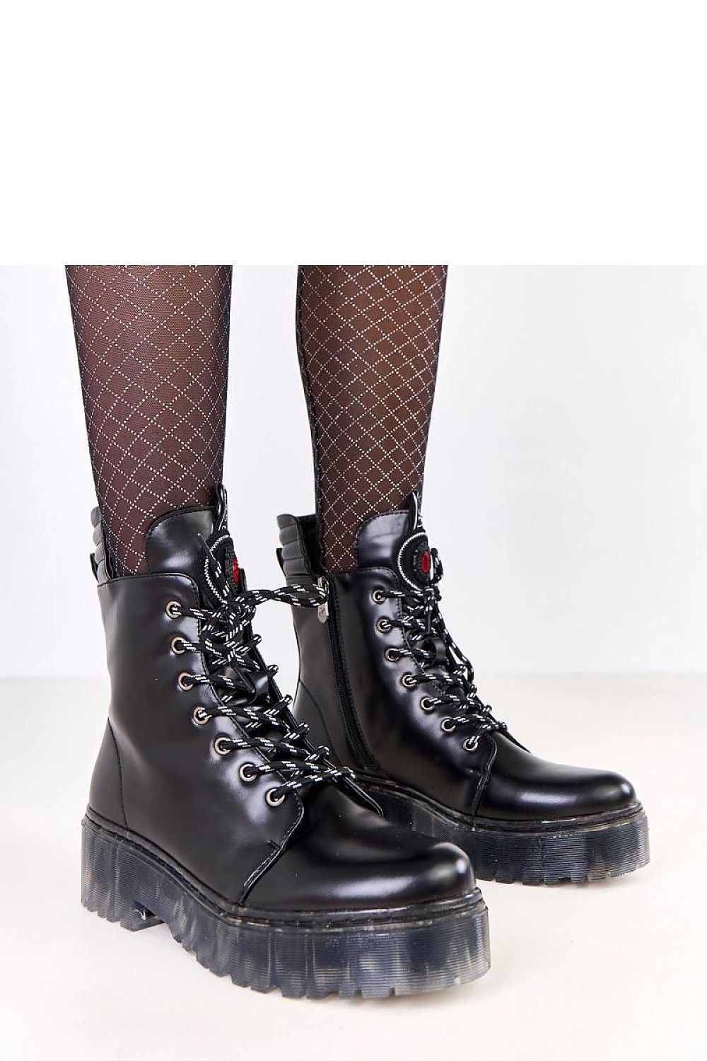 Solea Women's Stylish Winter Trapper Boots in luxurious faux leather, featuring a comfortable rounded toe and 17 cm high shaft for added warmth, ideal for elegant winter outings.