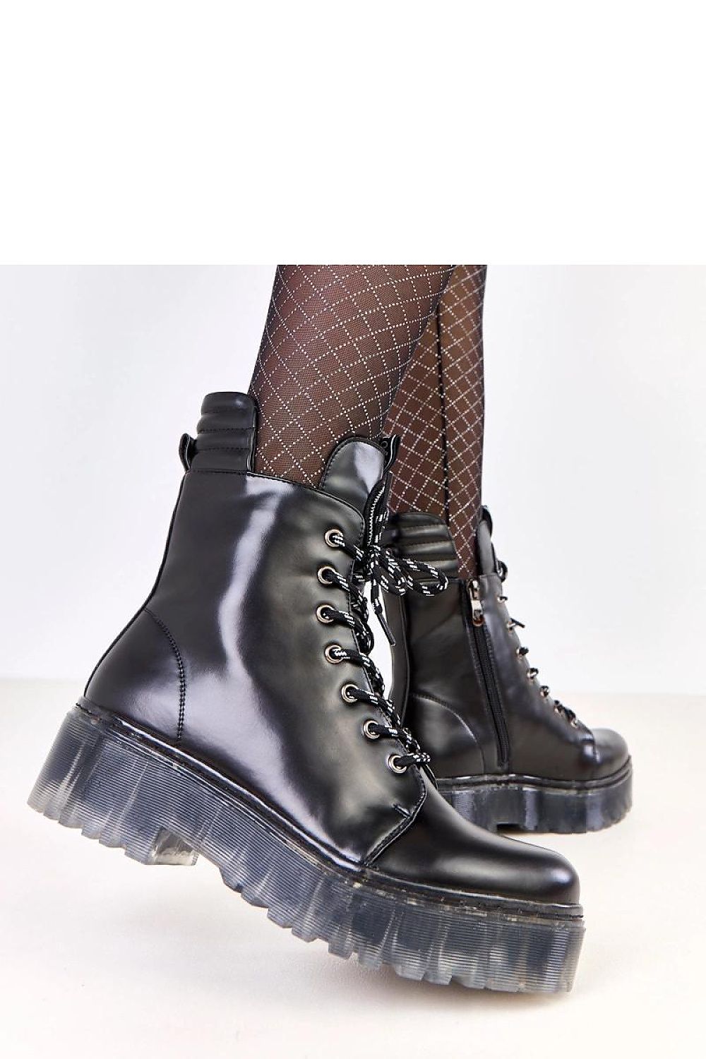 Solea Women's Stylish Winter Trapper Boots in luxurious faux leather, featuring a 17 cm insulated shaft for ultimate warmth and comfort during winter. Perfectly designed for elegance and functionality.