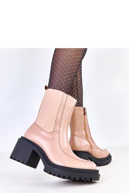 Elegant women's ankle boots in eco-leather by Solea featuring a stylish 7.5 cm heel, perfect for cooler days with a warm interior and 18 cm high upper for comfort and sophistication.