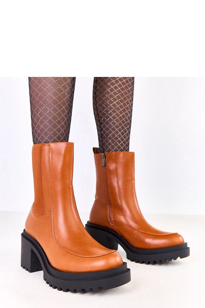 Elegant Solea stylish eco-leather ankle boots with 7.5 cm heel, showcasing a round toe and warm interior for ultimate comfort.