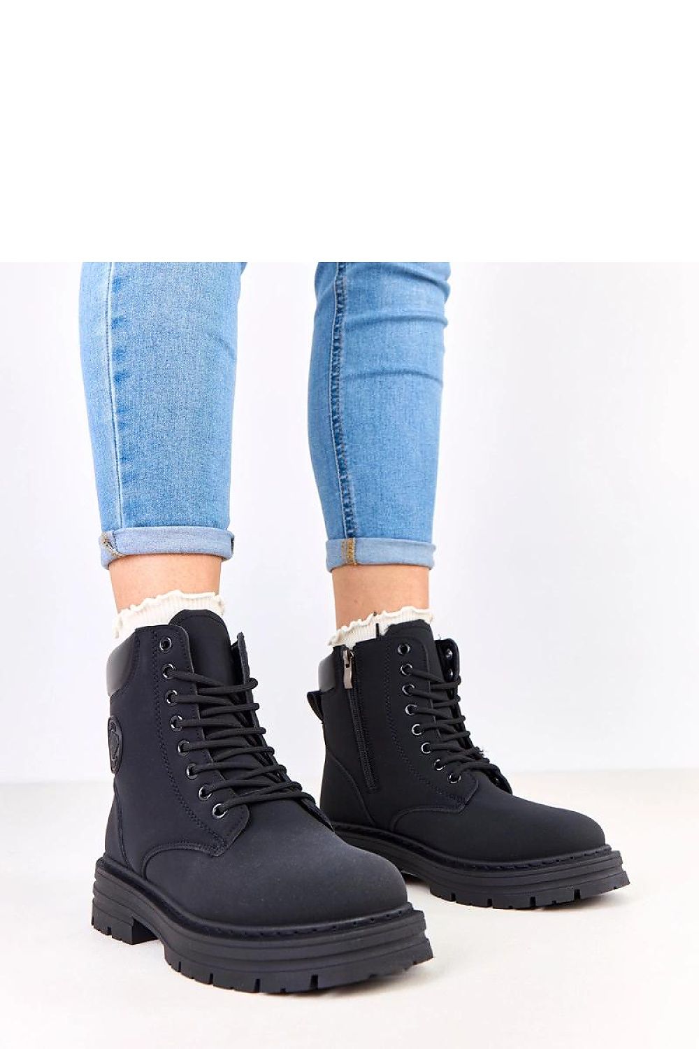 Luxury women's winter boots by Solea featuring a stylish fur-lined interior, durable matte synthetic leather, a round toe, and a stable 4cm heel for elegance and comfort during the colder months.