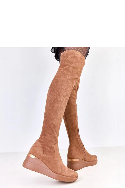 Chic Solea Roland boots made from soft eco-suede, designed with a metallic heel insert and stylish rounded toe for a modern and elegant look.