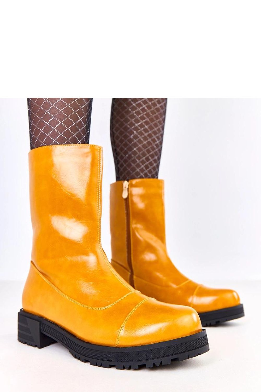 Luxury Solea women's vivid orange ankle boots made from eco-leather with a stylish design, showcasing a comfortable round toe and 4cm heel.