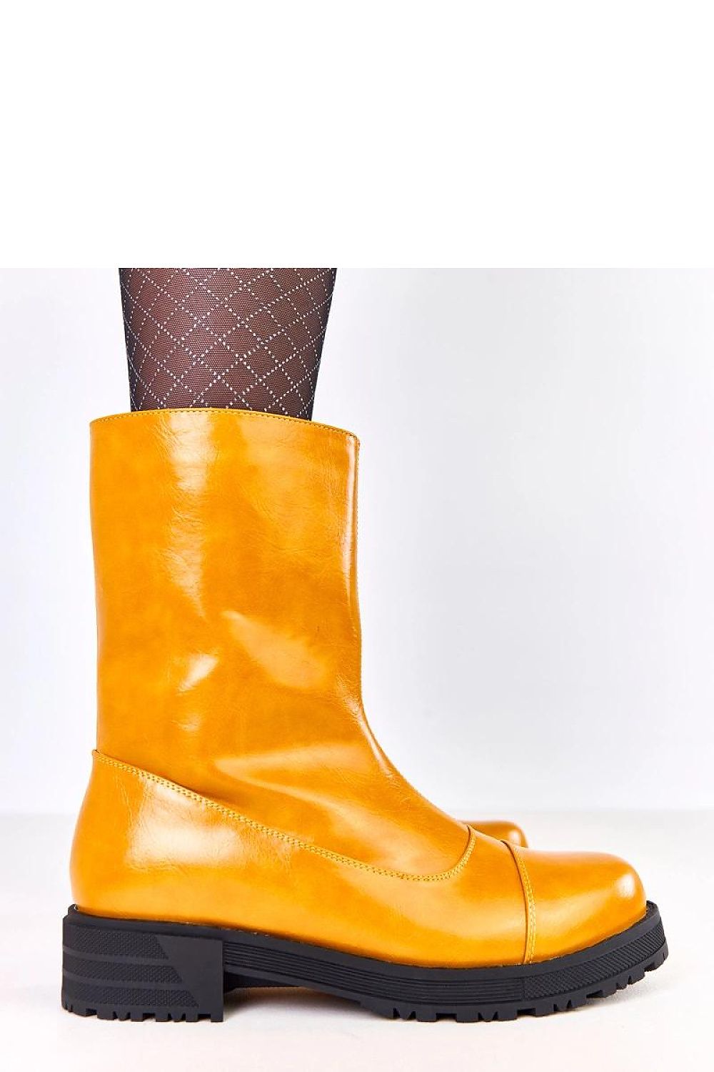 Elegant Solea ankle boots featuring vibrant orange eco-leather, ideal for chic winter looks, with high shaft and insulated comfort.