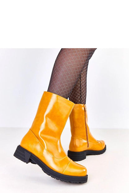 Sophisticated Solea eco-leather ankle boots in striking orange, designed for women, combining fashion with functionality and comfort.