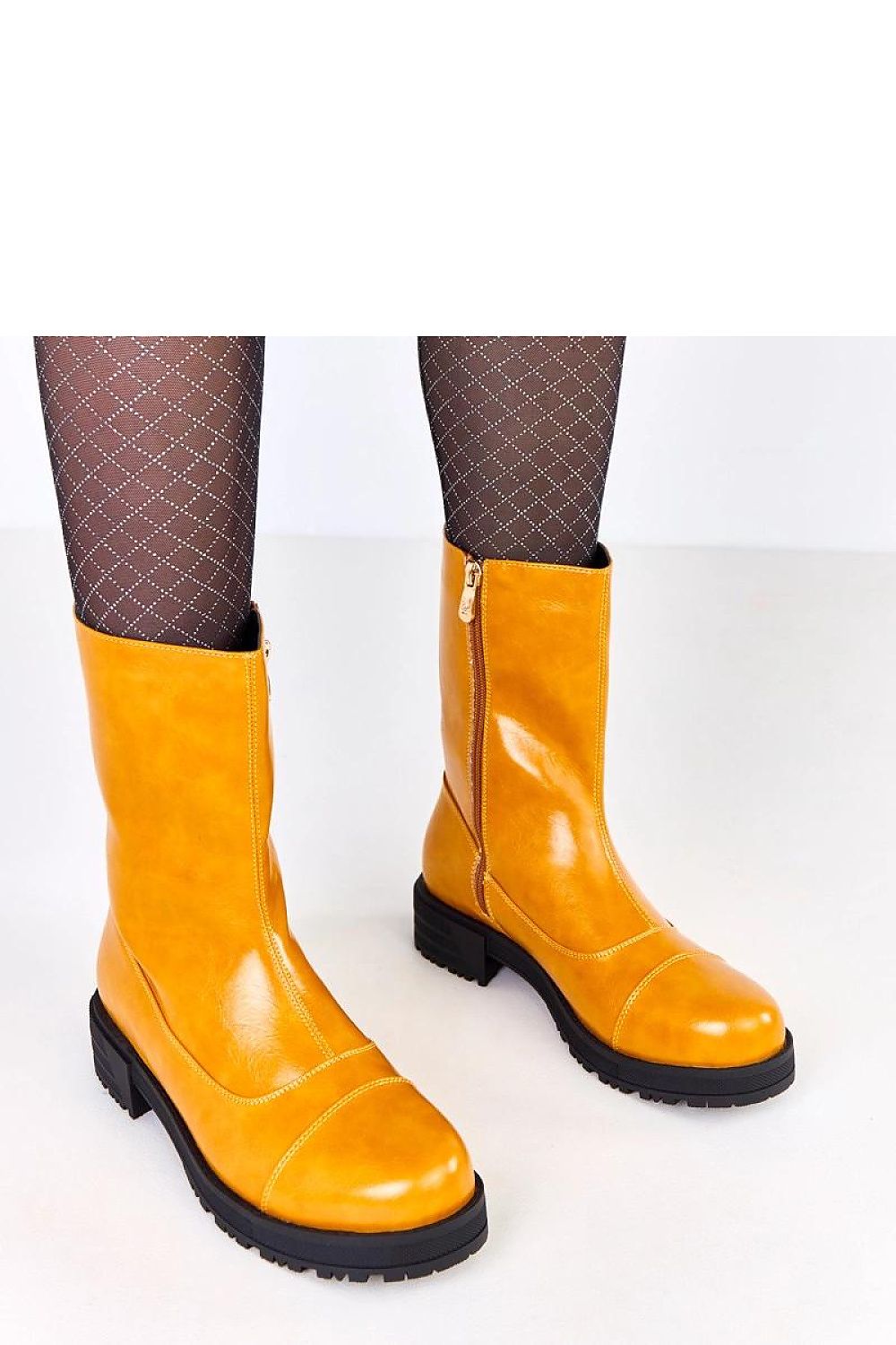 Stylish Solea ankle boots for women in radiant orange, crafted with high-quality materials and equipped with a durable zipper for easy wear.