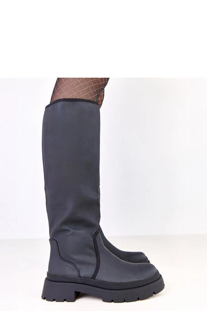 Elegantly designed matte faux leather thigh-high boots by Solea, featuring a 5.5 cm heel, perfect for winter styling.