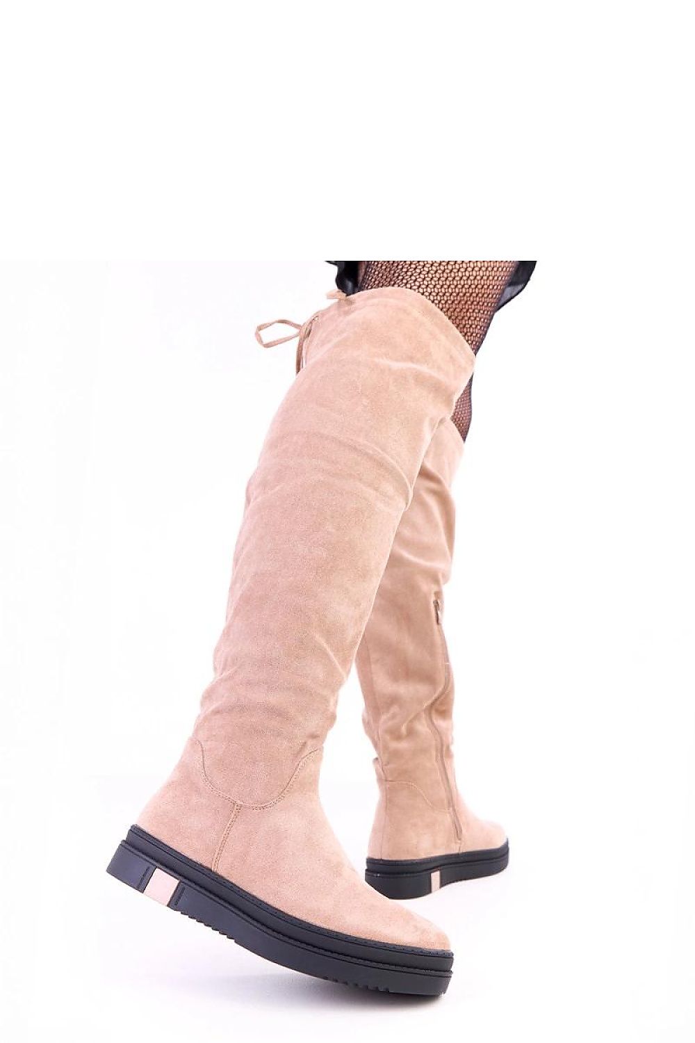 Elegant thigh-high platform boots for women crafted by Solea, featuring faux suede material and a sophisticated round toe design.