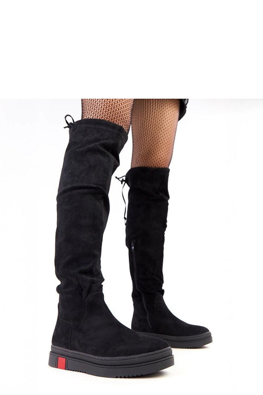 Close-up of Solea eco-friendly suede thigh-high platform boots highlighting the soft texture and round toe, perfect for enhancing your stylish outfits.