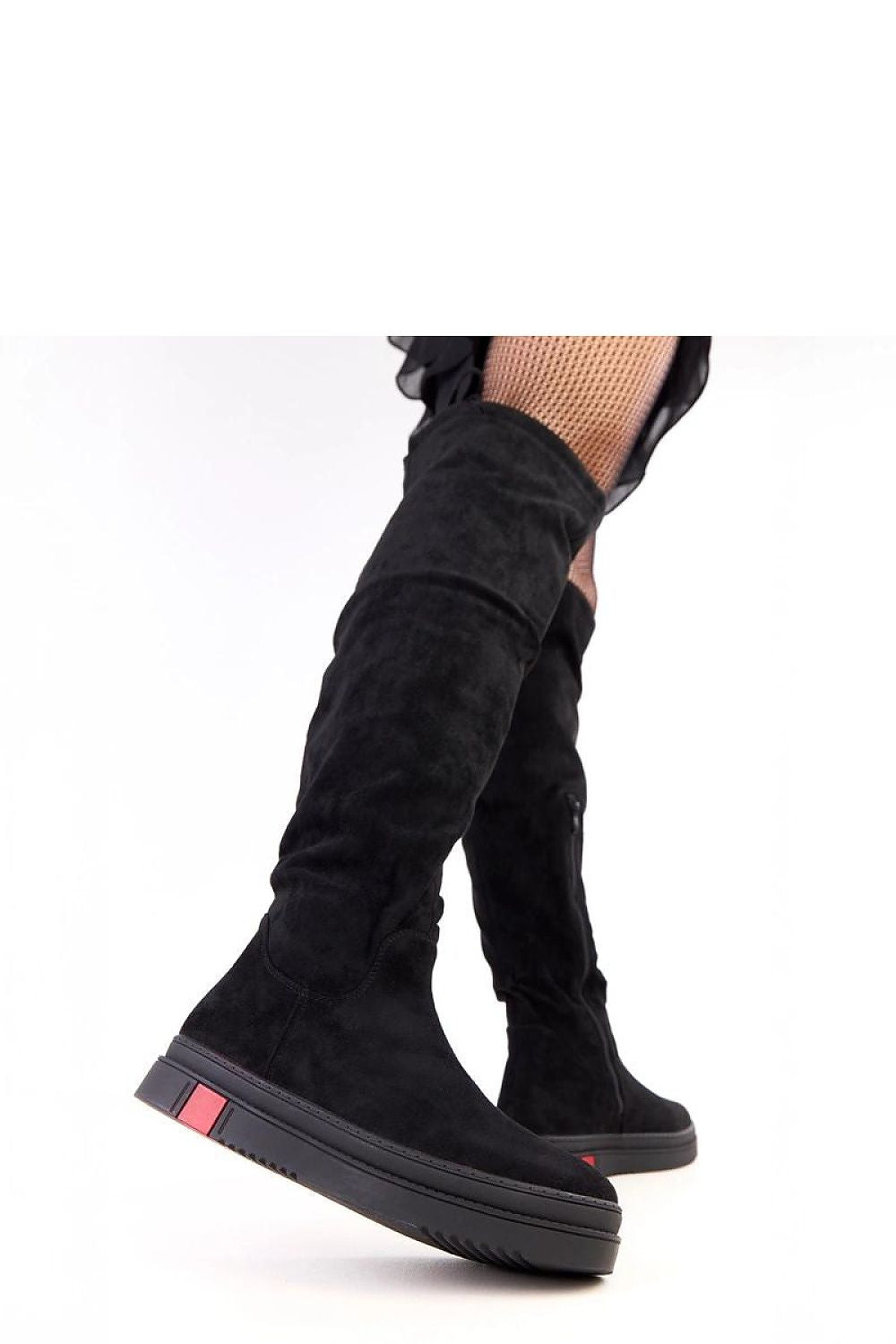 Solea thigh-high platform boots displayed with a charming background, exemplifying comfort and modern fashion ideal for chic everyday styling.