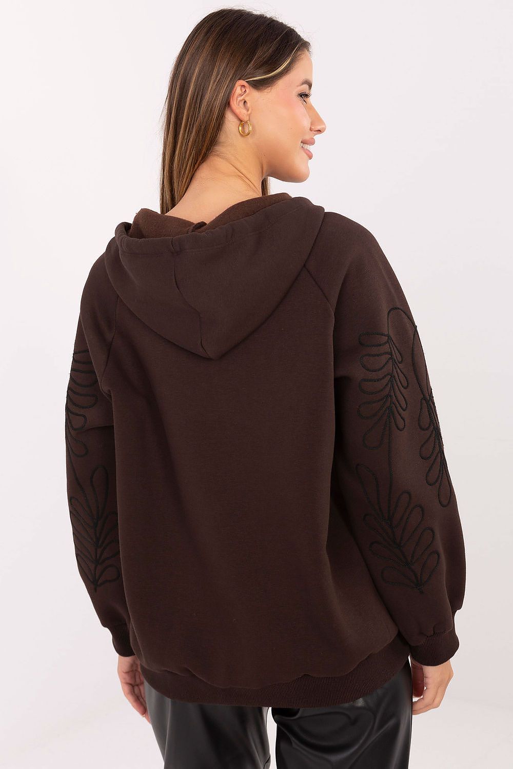 Side view of a luxury women's hoodie with zip closure and practical front pockets, perfect for casual styling, by Relevance.