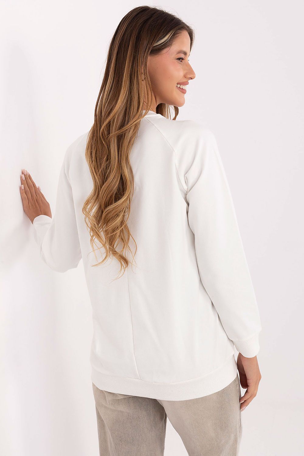 Sophisticated casual sweatshirt for women by Relevance, highlighting feminine accents through subtle embroidered details.