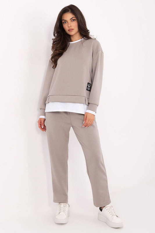 Rue Paris Women's Casual Set featuring soft buttery fabric, high-waisted trousers, and elegant sweatshirt for chic and comfortable everyday wear.