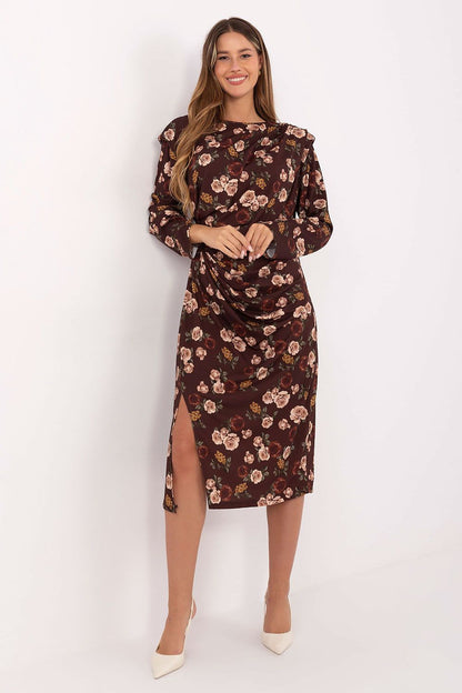 Elegant Rue Paris midi dress in floral pattern featuring shoulder pads and draping, showcasing a sleek silhouette for a luxurious look.