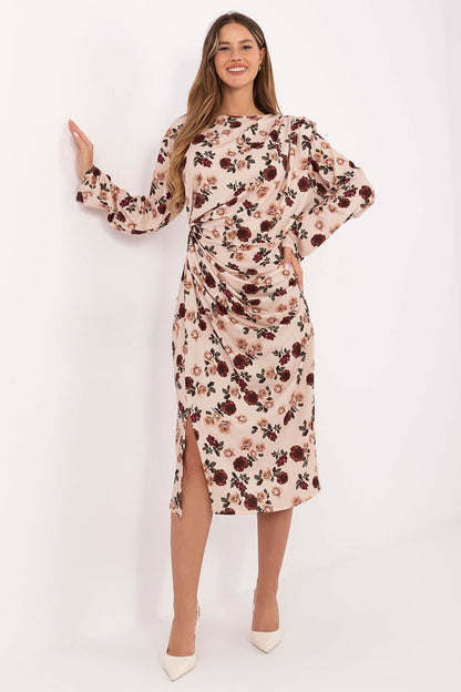 Elegant midi dress by Rue Paris featuring a beautiful floral pattern and exquisite padded shoulders, ideal for various occasions.