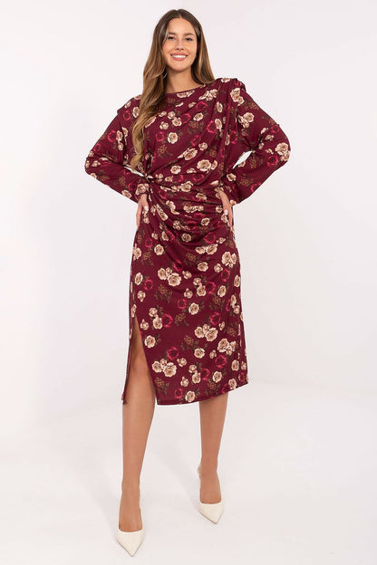 Elegant midi dress by Rue Paris featuring a floral pattern, padded shoulders, and long sleeves, perfect for sophisticated occasions.