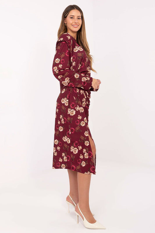 Elegant midi dress by Rue Paris featuring a floral pattern, long sleeves, round neckline, and padded shoulders, ideal for sophisticated occasions.