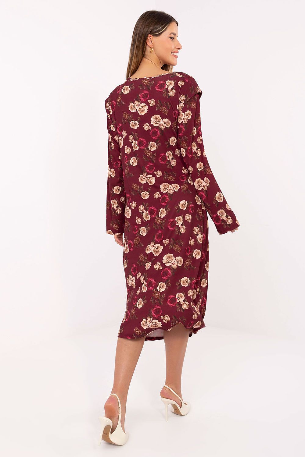 Close-up of the romantic floral design on an elegant midi dress by Rue Paris, showcasing the high-quality fabric and feminine silhouette.