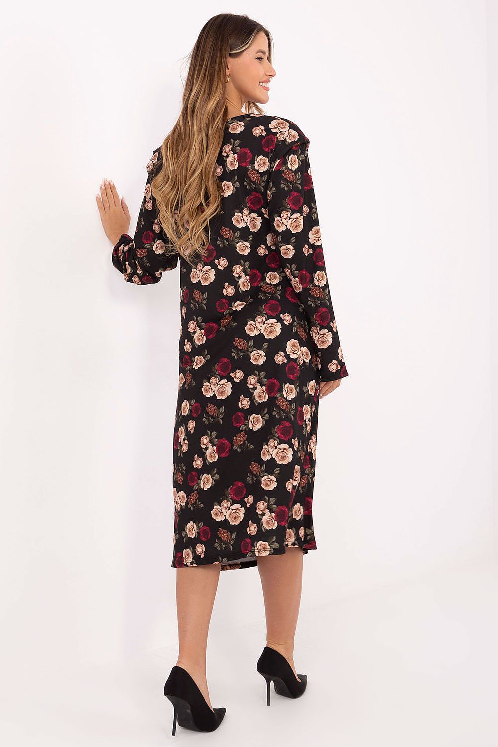 Model wearing the Rue Paris elegant midi dress with floral design, featuring long sleeves and a round neckline, demonstrating the perfect balance of comfort and sophistication.