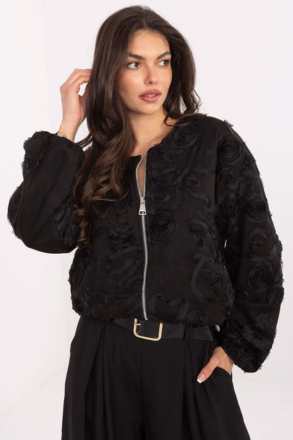 Elegant women's bomber jacket by Rue Paris featuring intricate flower appliqué, perfect for autumn-spring layering.