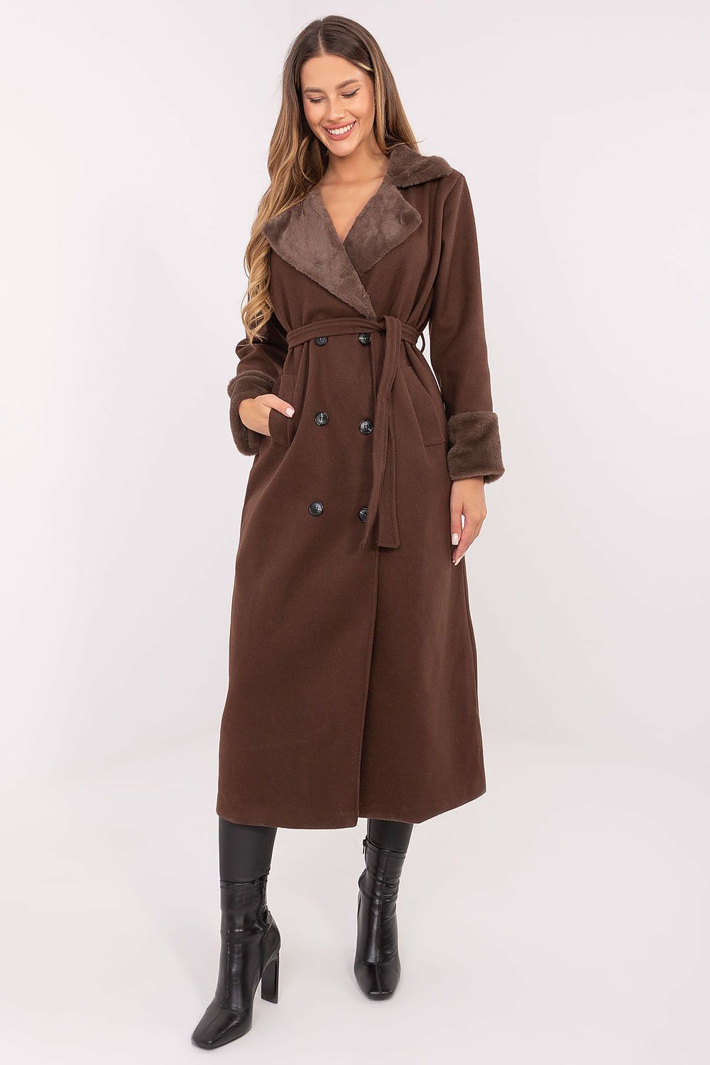 Elegant long winter coat for women by Rue Paris, featuring a double-breasted design and a stylish belt, crafted with soft lining for warmth and comfort, available in EU sizes 0 to 6.