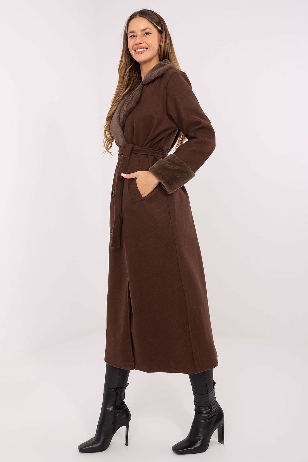Luxurious long winter coat for women by Rue Paris, featuring a double-breasted design and a stylish belt, designed for elegance and warmth in cold weather.