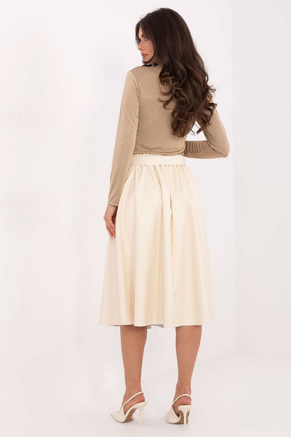 Stylish ensemble featuring the Elegant Eco Leather Midi Skirt by Italy Moda, paired with a chic blouse, ideal for both work and casual occasions.