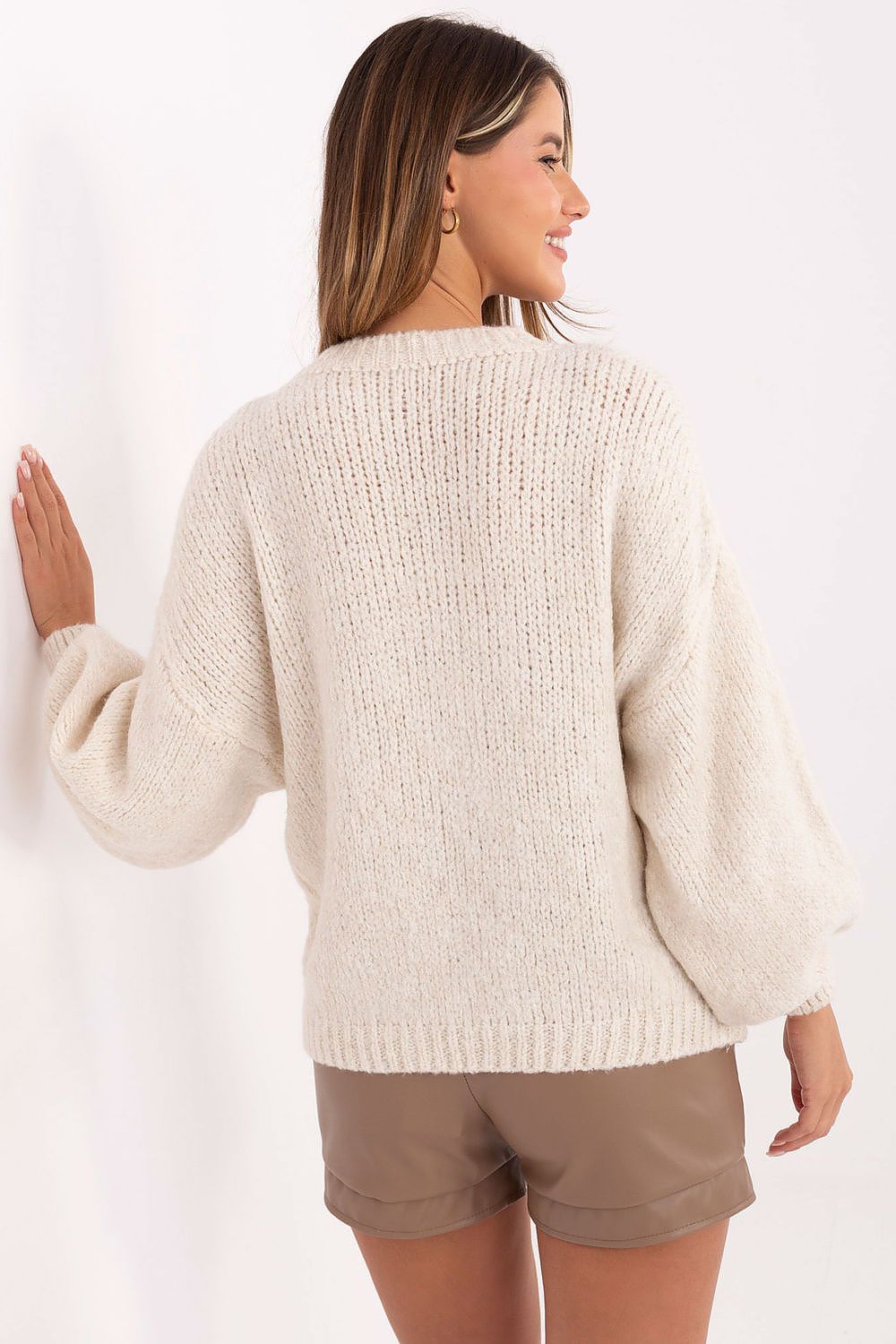 Italy Moda's elegant women's sweater, crafted from a soft blend of materials for warmth and style, perfect for pairing with jeans or skirts.