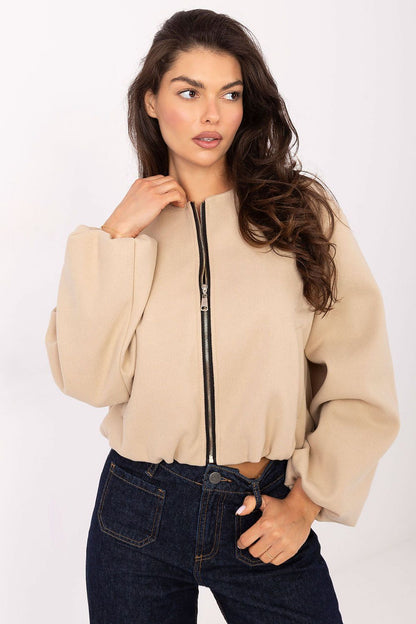 Elegant transitional jacket by Italy Moda featuring a trendy balloon silhouette, perfect for autumn to spring fashion. This modern feminine design is made from high-quality polyester, ideal for both casual and sophisticated looks.
