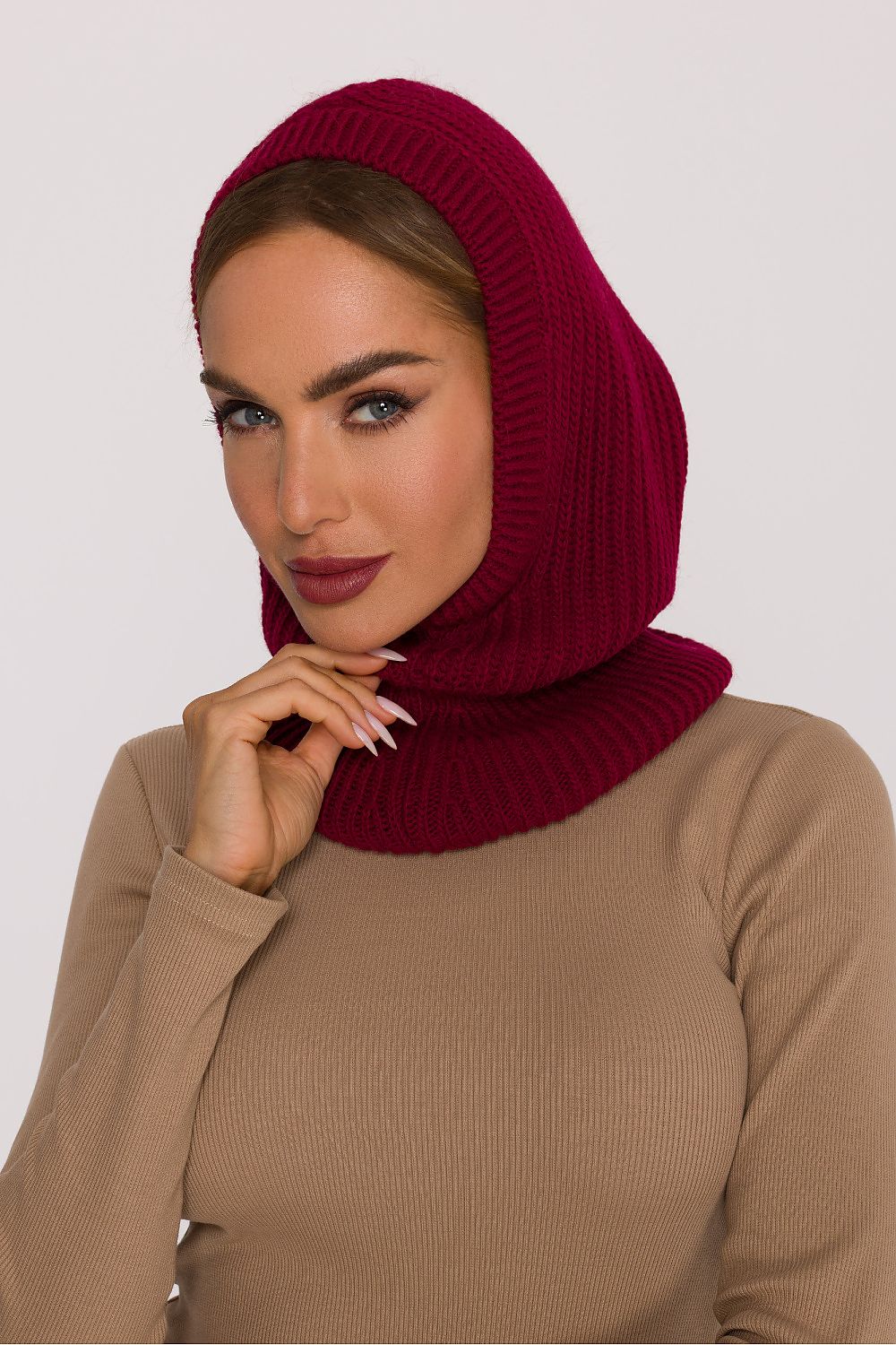 Moe's fitted balaclava in a chic display, emphasizing its lightweight construction and perfect fit for cold-weather activities.