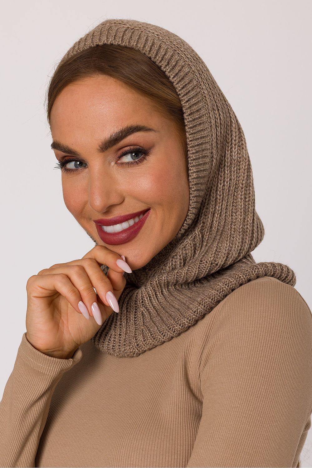 Moe luxury balaclava displayed on a model, illustrating its close-fitting cut and elastic cuffs for a stylish and warm winter accessory.