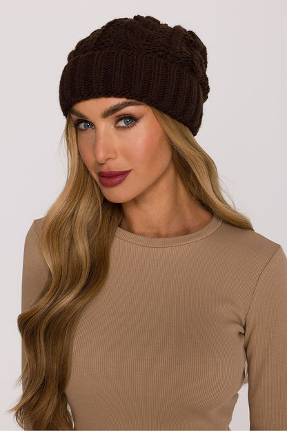 Model wearing the Luxury Braided Knit Cap by Moe, demonstrating its perfect fit and chic style during winter outings.
