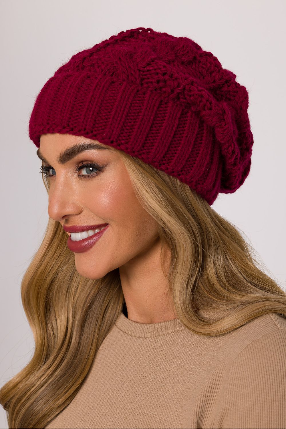 Model wearing the Luxury Braided Knit Cap by Moe, emphasizing its casual style and comfortable fit for the colder months.