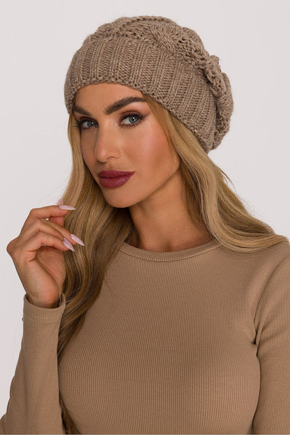 Luxury Braided Knit Cap by Moe displayed on a neutral background, showcasing the classic and sophisticated design in soft yarn.
