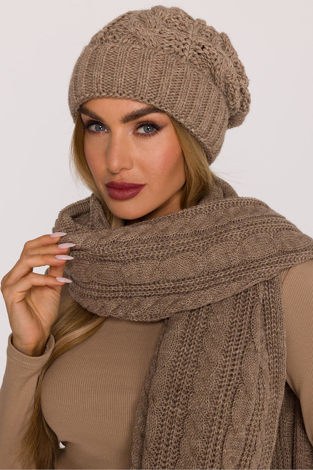 Moe's Luxury Braided Knit Cap featuring a folded edge, perfect for warmth and style in winter fashion, made from high-quality acrylic and nylon.