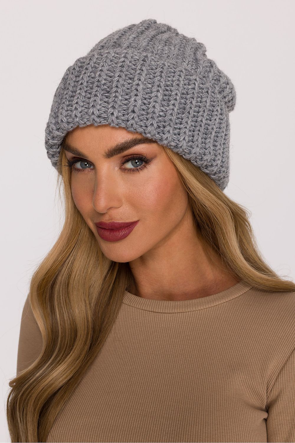 Luxurious soft acrylic and nylon blend ribbed knit cap by Moe, showcasing a modern relaxed fit and folded edge for added warmth and style.