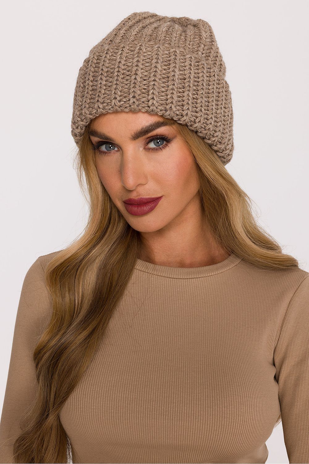 Moe's premium ribbed knit hat, featuring a folded edge for superior warmth and a chic silhouette.