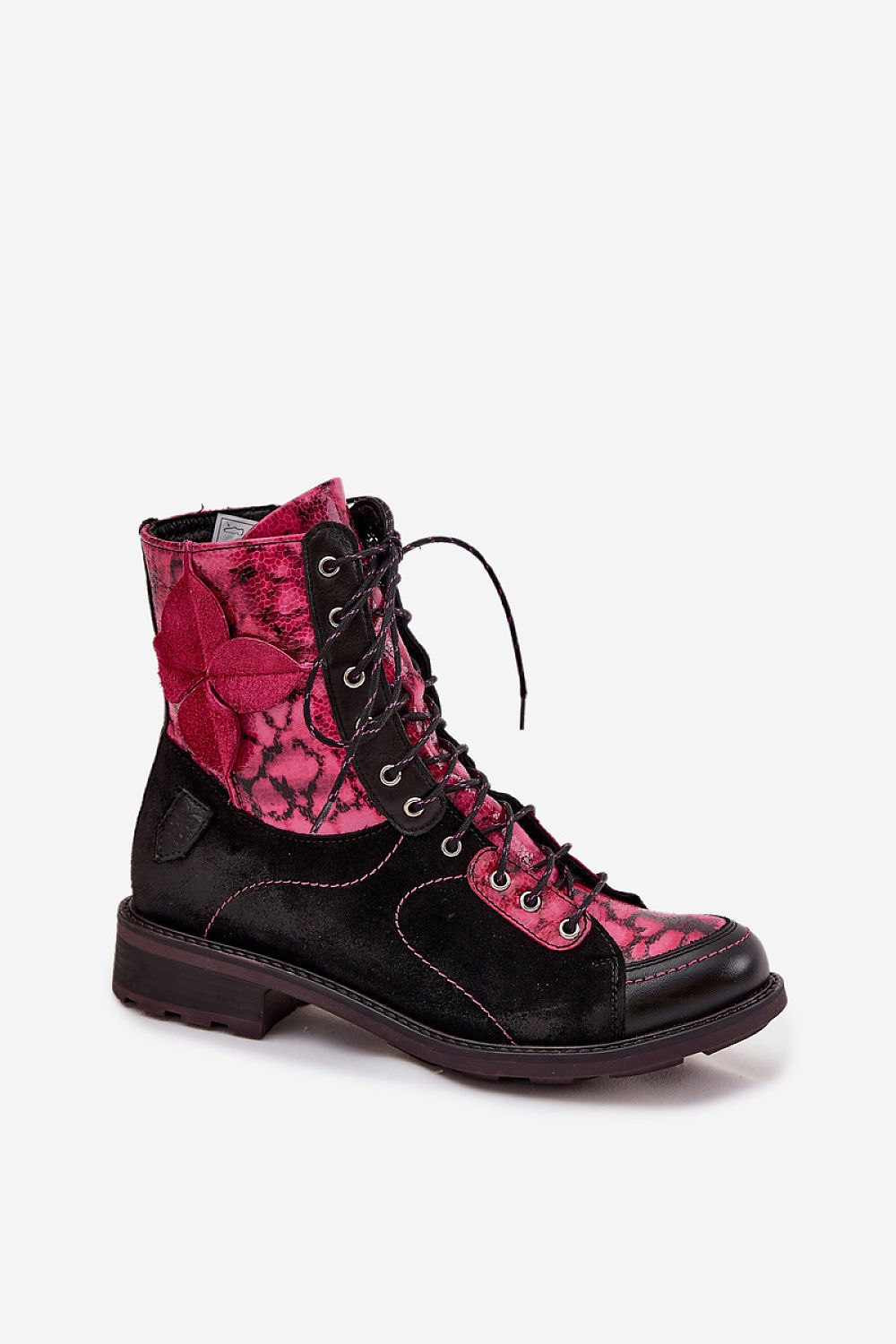 Close-up view of Maciejka women's ankle boots showcasing the beautiful floral design and high-quality leather texture, brought to you by Step in Style for a luxurious feel.