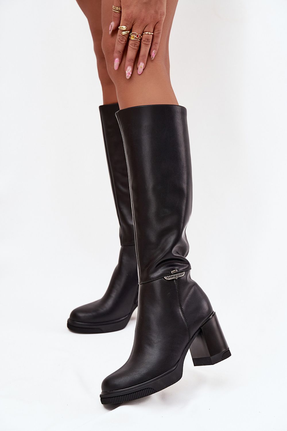 Close-up of Vinceza Women's Musketeer Heeled Leather Boots highlighting the luxurious natural leather and decorative side detail, embodying an exquisite blend of style and comfort.